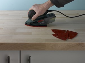 sanding wooden kitchen worktop
