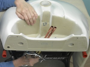 threading tap and pipes into basin