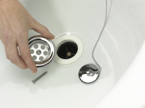 Positioning plughole in bath