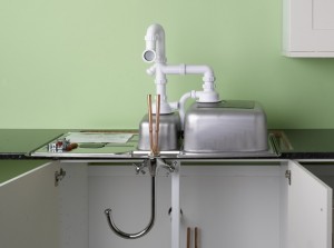 assembling the sink, tap and waste for kitchen sink