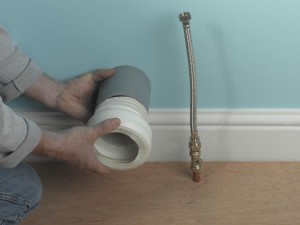 inserting pan connector for toilet
