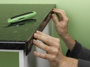 Fitting kitchen worktop edging strip