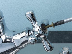 Removing tap handle screw