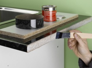 applying contact adhesive to worktop edge