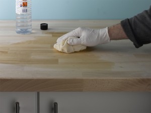 cleaning down wooden worktop