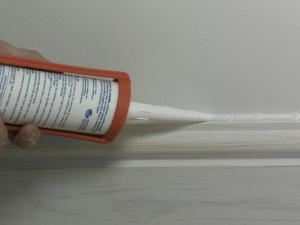 applying caulk