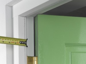 marking edge of door frame for draught excluder