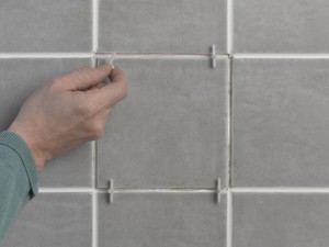 inserting tile spacers