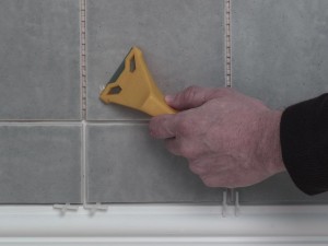 removing hardened tile adhesive