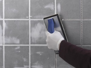 grouting tiles