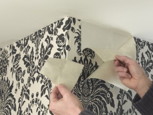 wallpapering around corners and removing excess