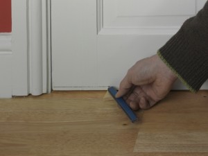 marking bottom edge of door