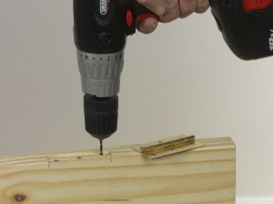 pilot drill holes