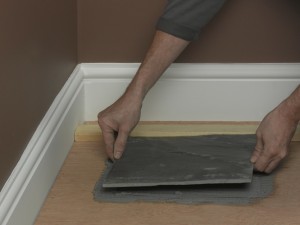 laying first tile
