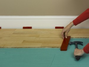 engineered floor knocking block
