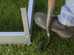 Digging holes for greenhouse base