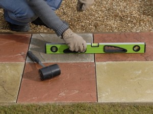 checking paving slabs are level