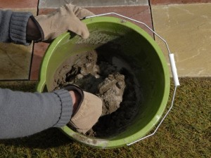 mixing mortar in a bucket