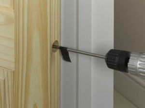 drilling hole for door closer on hinging edge of door