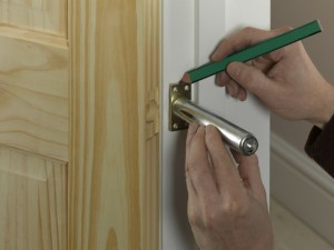 marking around edge of plate on door closer