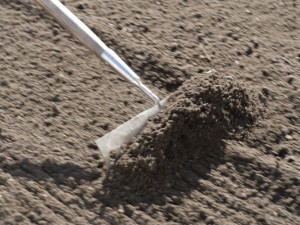 Raking ground before laying turf