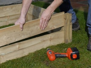 Slotting together sections of raised garden bed