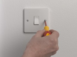 Unscrewing light switch plate