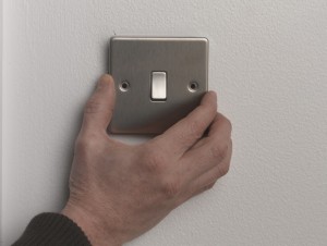 Repositioning switch plate