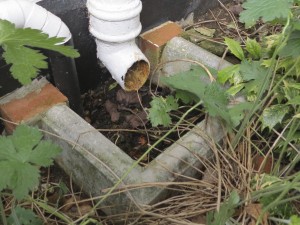 Downpipe leading to gully